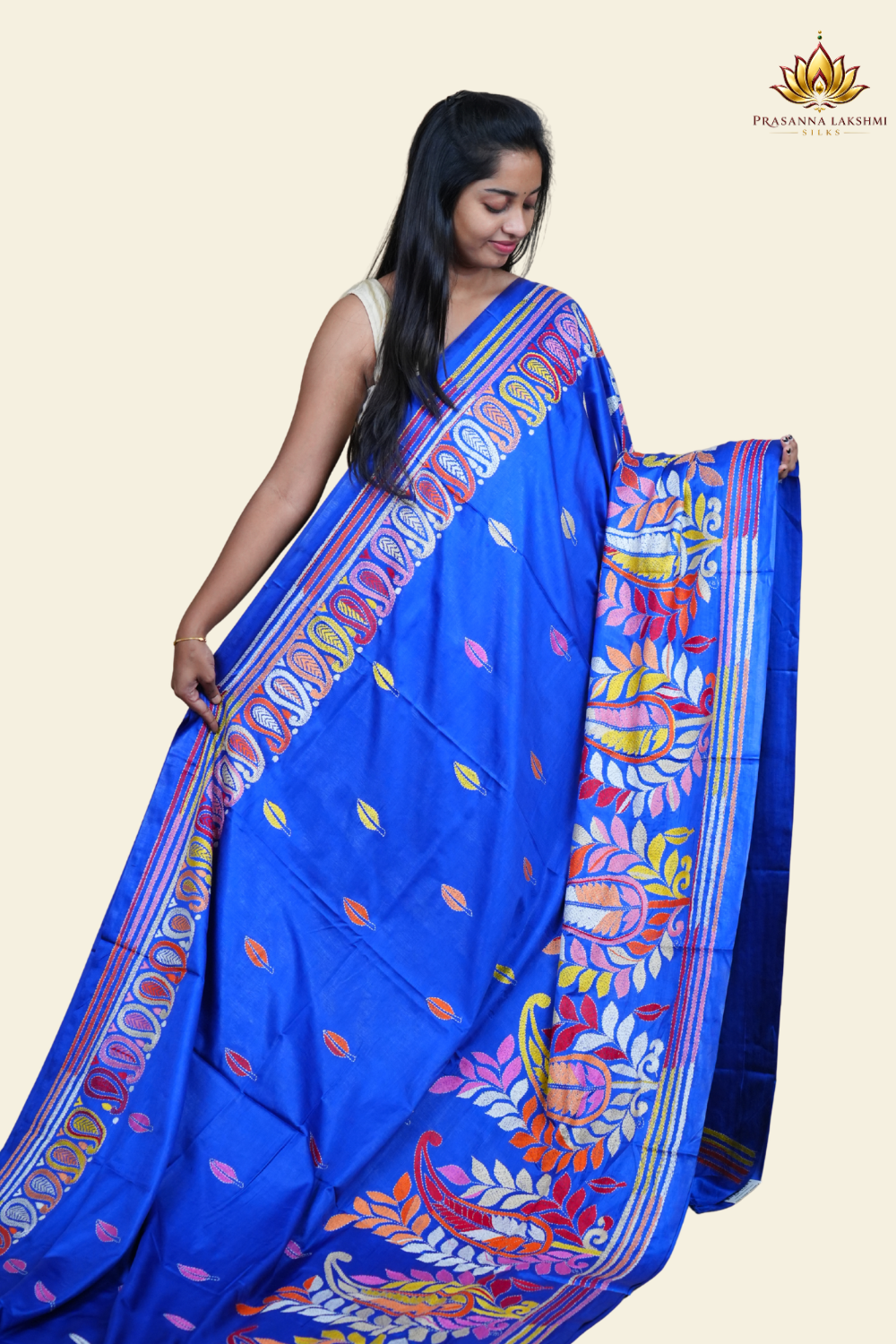 Elegant silk saree featuring Kantha work borders and detailed Kantha pallu design.

