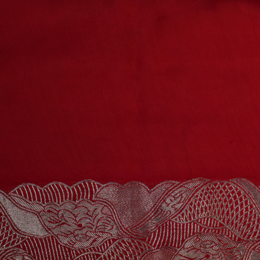 Festive Banarasi Mashru silk saree with intricate zari detailing and contrast blouse
