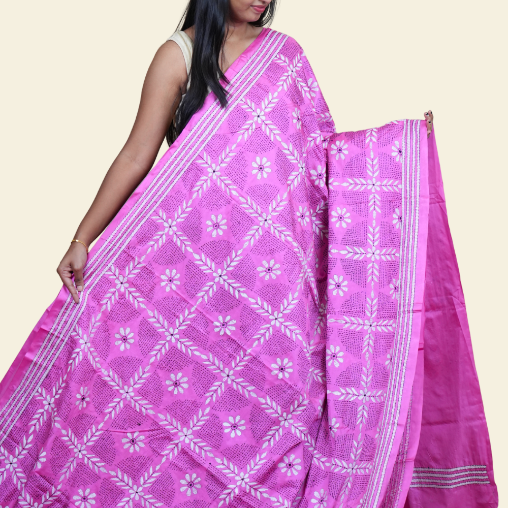 Elegant silk saree featuring Kantha work borders and detailed Kantha pallu design.
