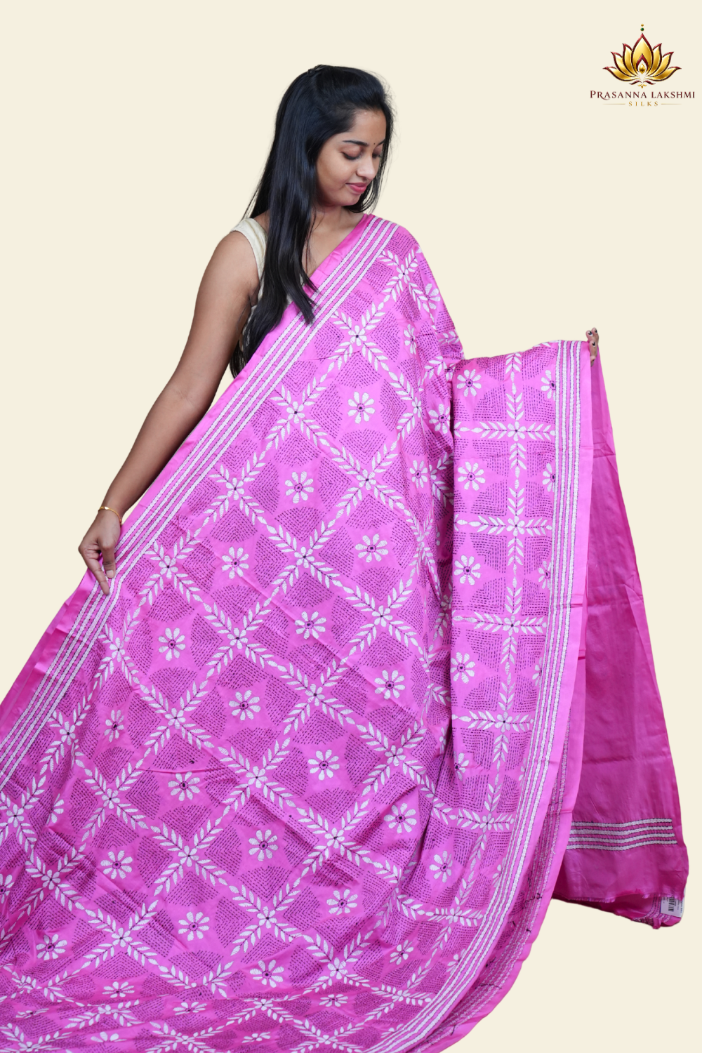 Elegant silk saree featuring Kantha work borders and detailed Kantha pallu design.
