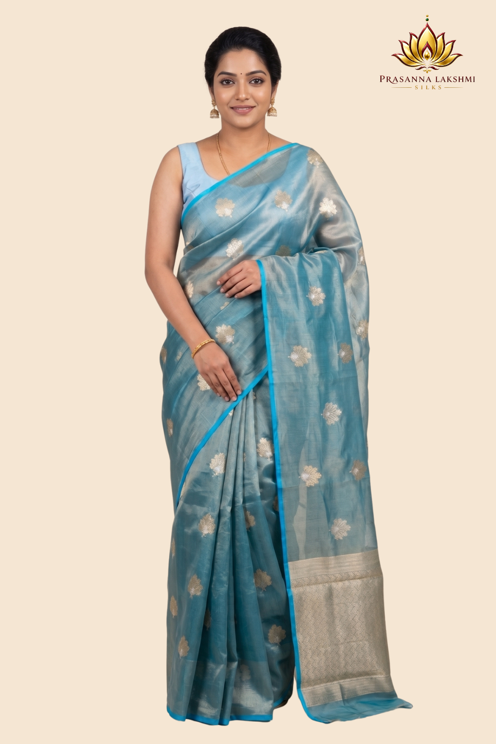 Kora tissue saree with allover gold flower motifs and silver highlights
