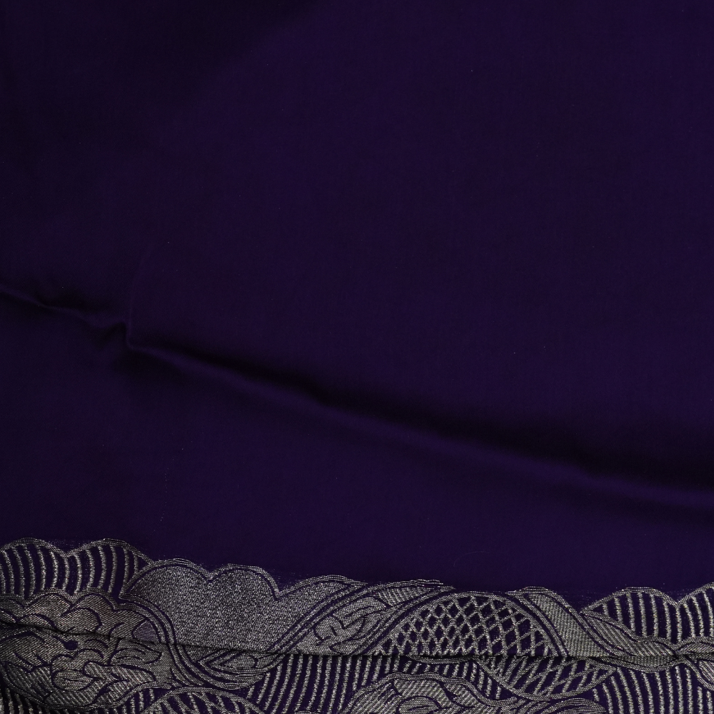 Festive Banarasi Mashru silk saree with intricate zari detailing and contrast blouse
