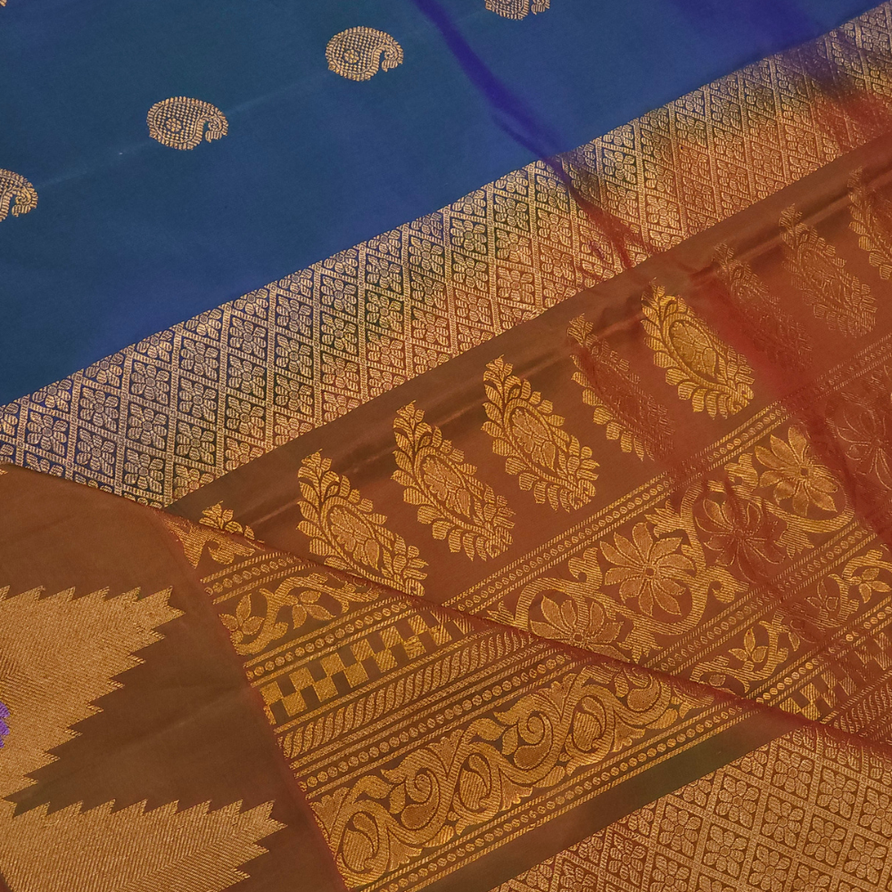 Elegant traditional Gadwal Silk Saree with rich zari weaving, meenakari border detailing, brocade pallu, perfect for weddings and festive occasions.