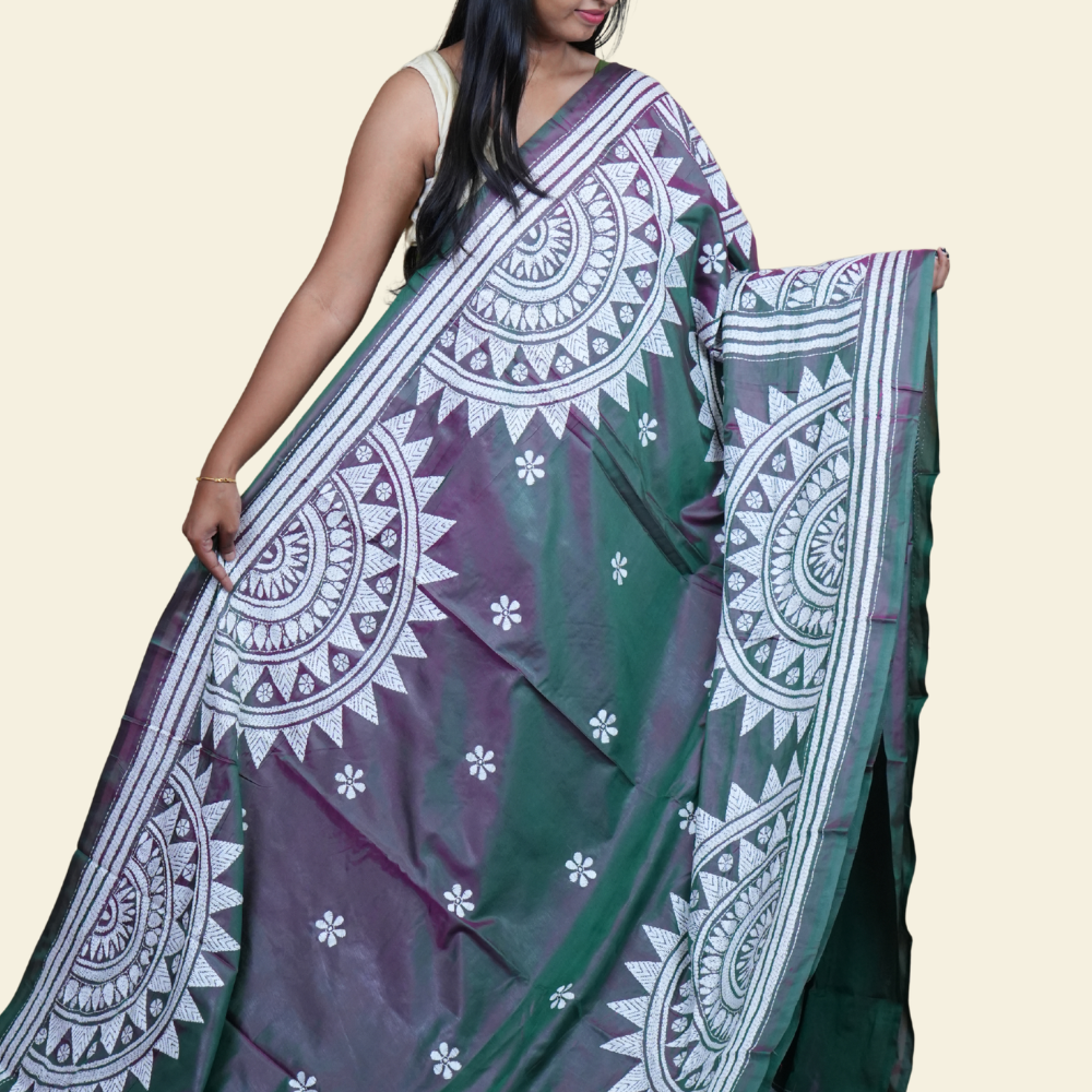 Elegant silk saree featuring Kantha work borders and detailed Kantha pallu design.
