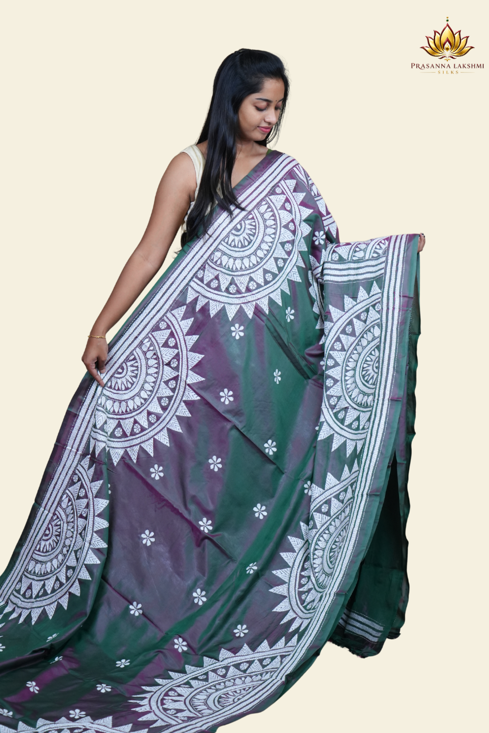 Elegant silk saree featuring Kantha work borders and detailed Kantha pallu design.
