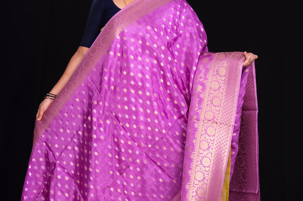  "Lavender Banaras saree with allover floral motifs  gold Zari  border"