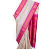 Handloom Gadwal pure silk saree with intricate small zari motifs and rich woven pallu.

