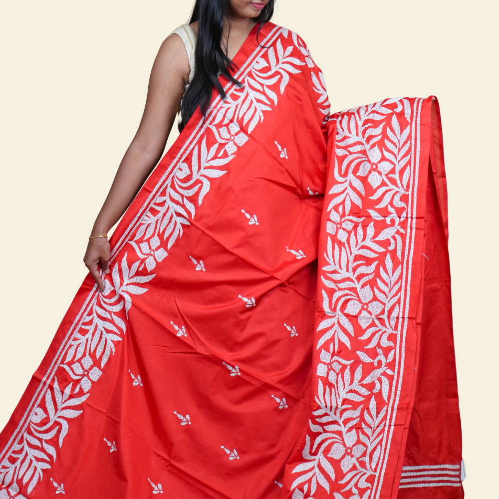 Elegant silk saree featuring Kantha work borders and detailed Kantha pallu design.
