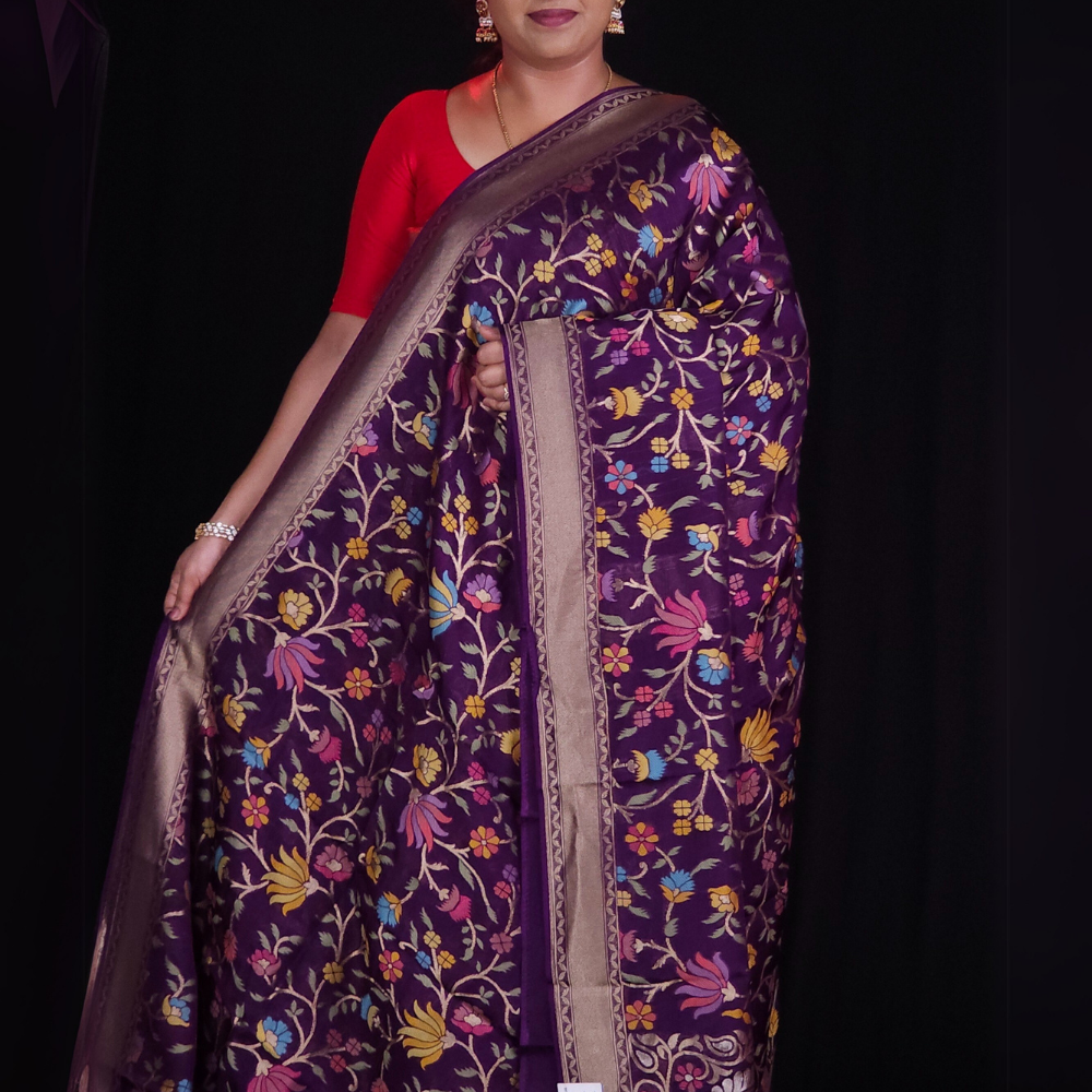 “Elegant floral organza saree with zari border”