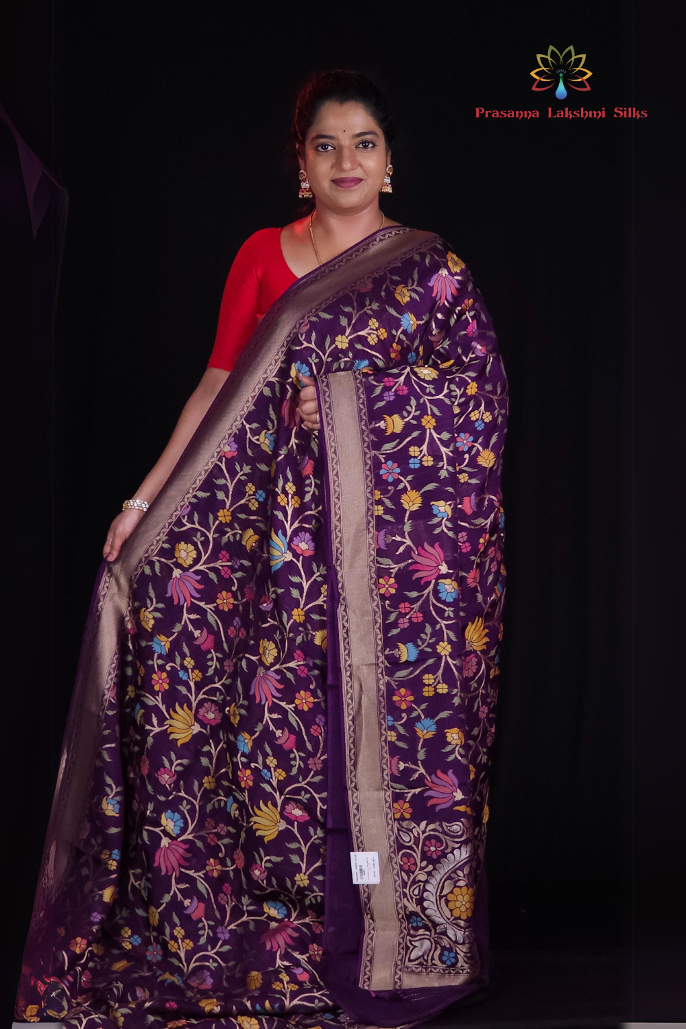 “Elegant floral organza saree with zari border”