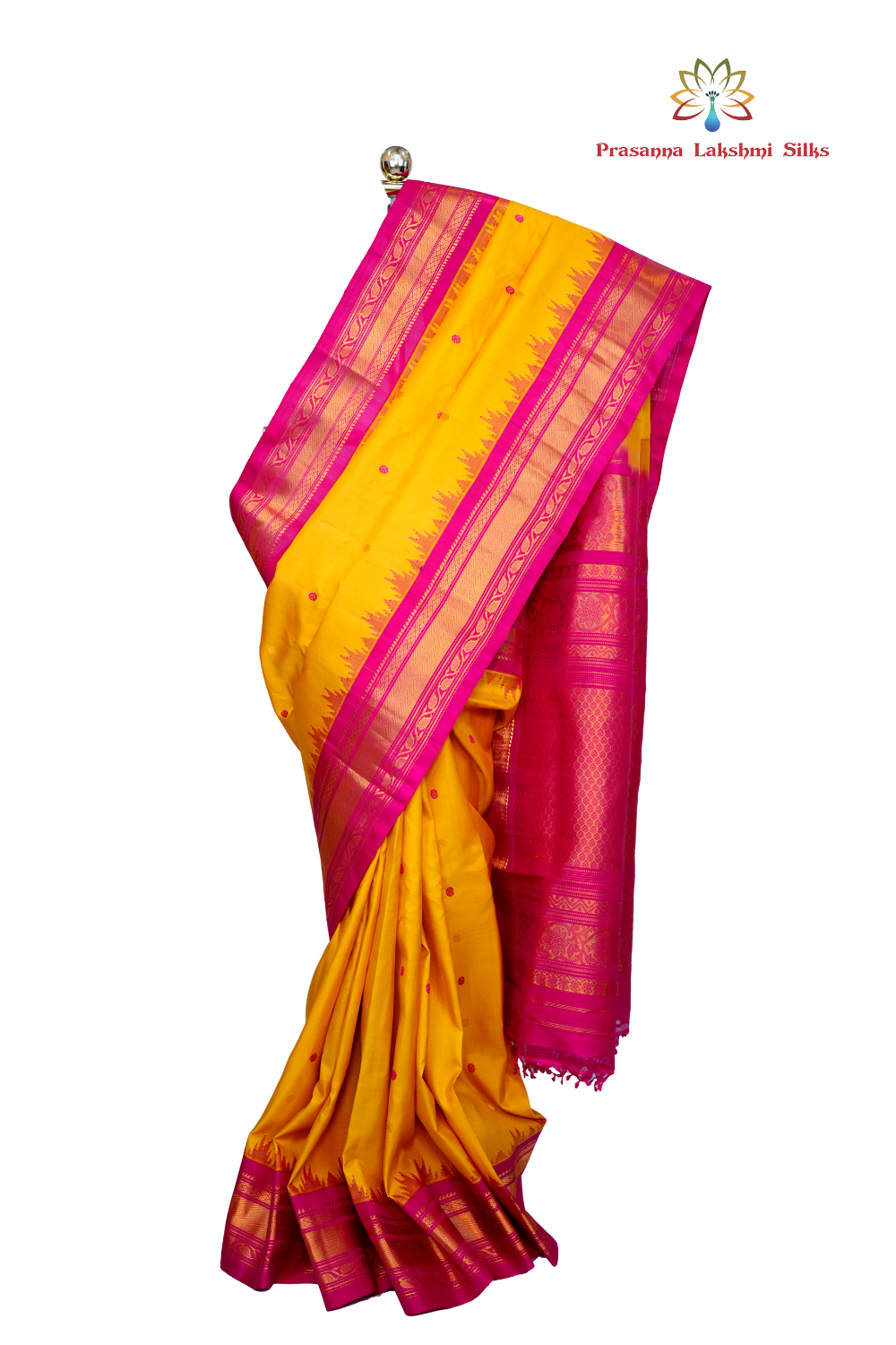 Handloom Gadwal pure silk saree with intricate small zari motifs and rich woven pallu.
