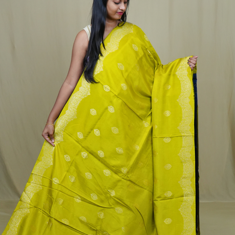 Elegant Banarasi Munga silk saree suitable for all occasions with intricate zari detailing.