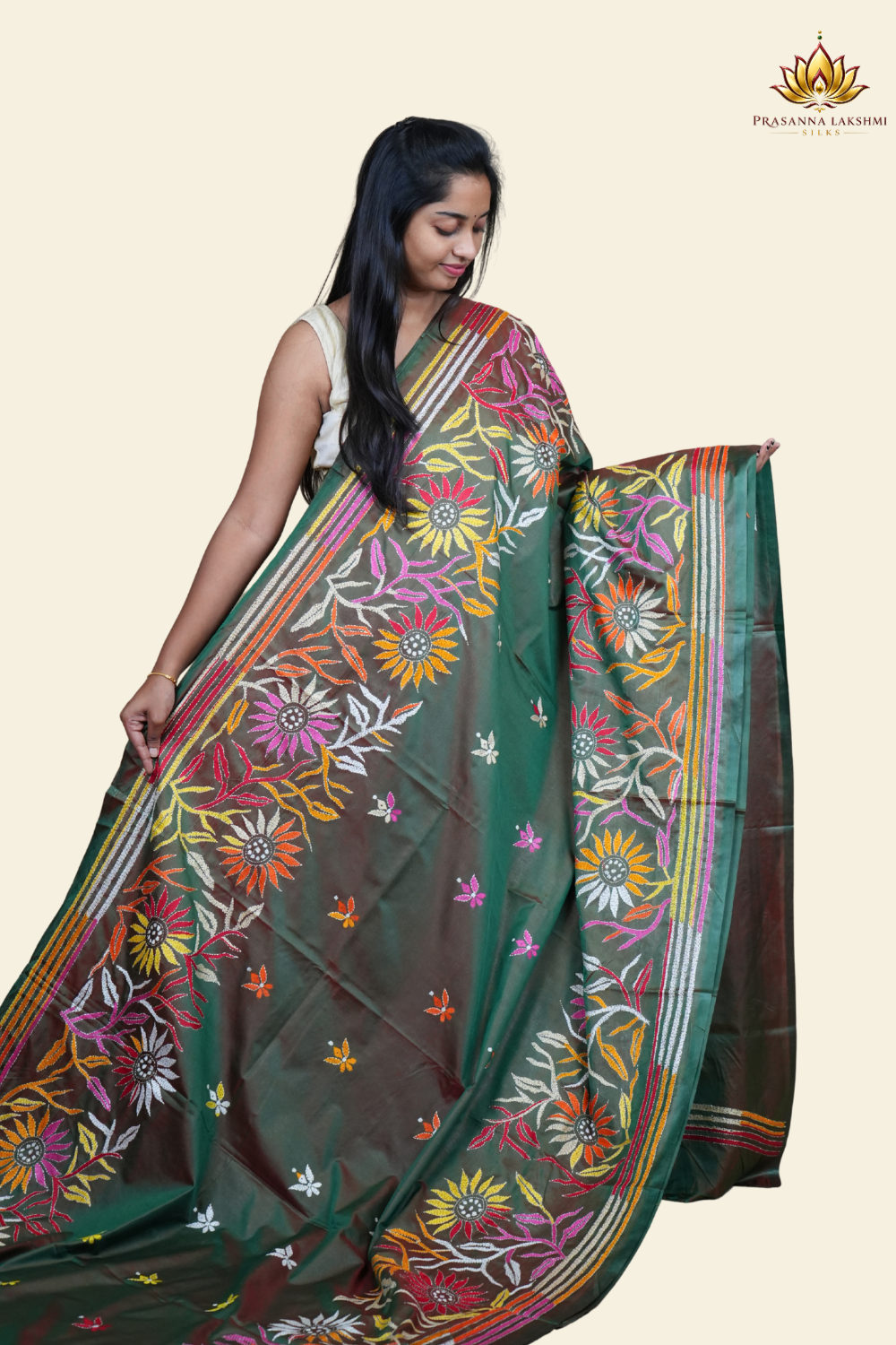Elegant silk saree featuring Kantha work borders and detailed Kantha pallu design.
