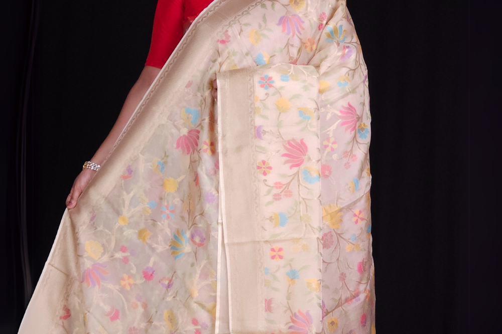 “Elegant floral organza saree with zari border”