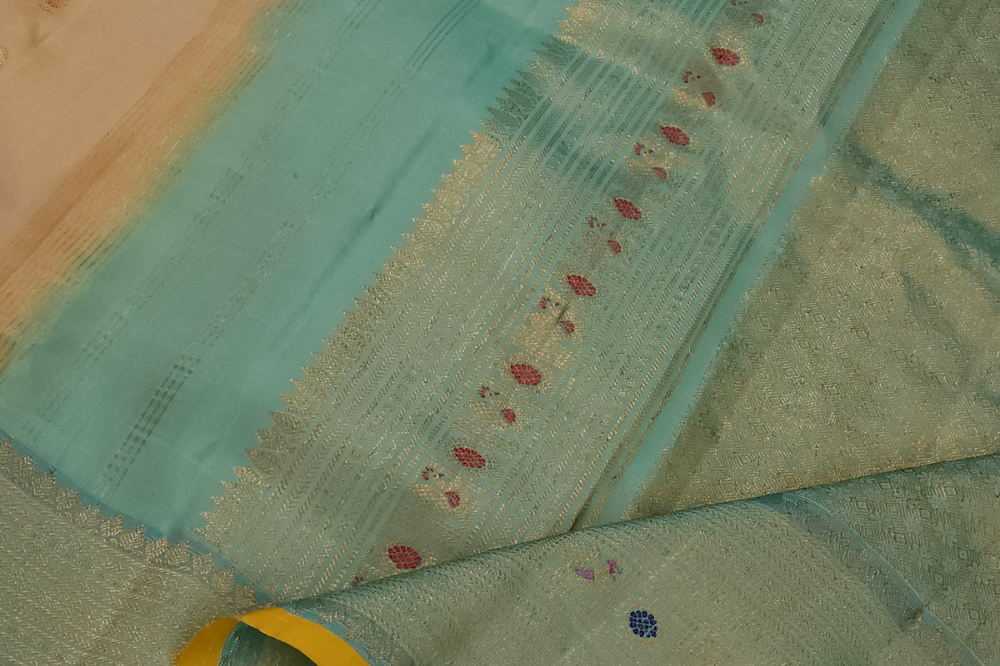 Elegant traditional Gadwal Silk Saree with rich zari weaving, meenakari border detailing, brocade pallu, perfect for weddings and festive occasions.