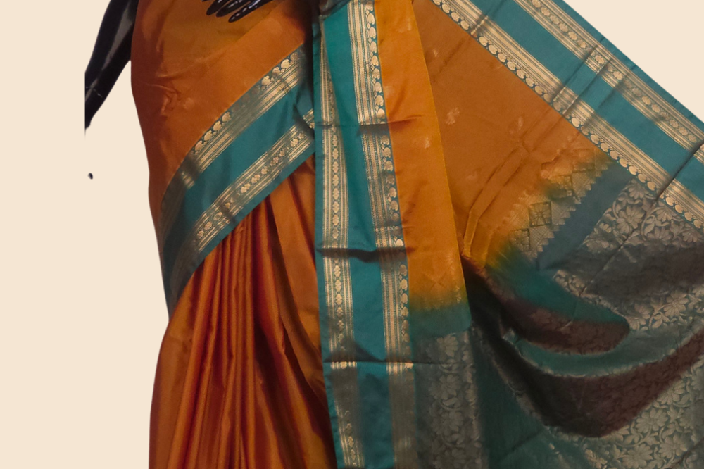 Semi Gadwal saree with horizontal zari motif stripes and zari woven gap borders
