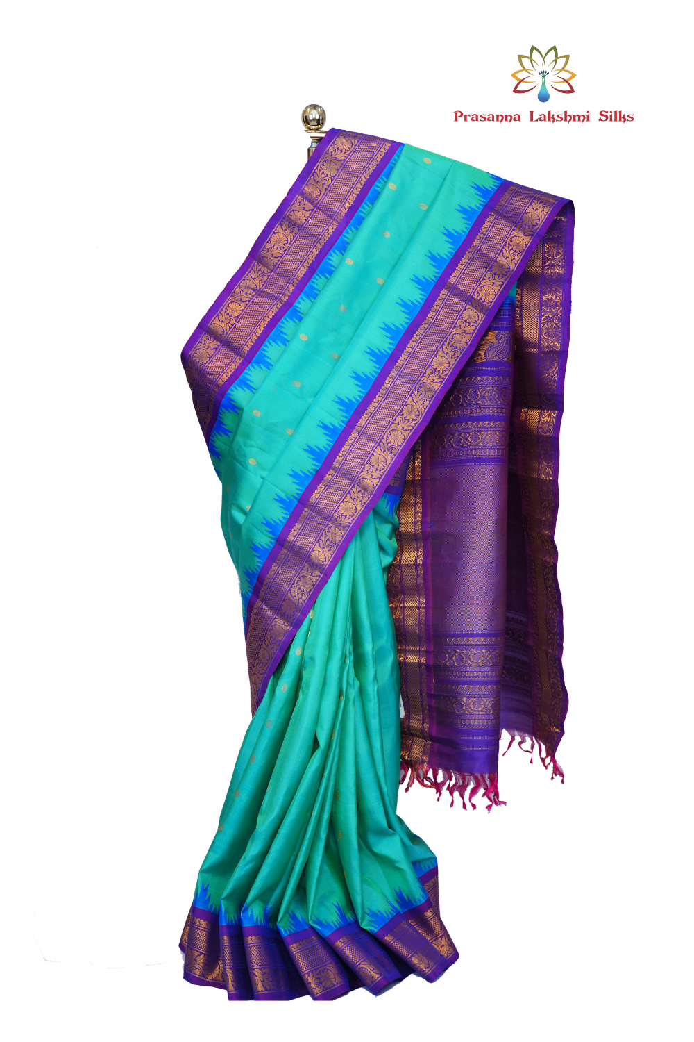 Handloom Gadwal pure silk saree with intricate small zari motifs and rich woven pallu.
