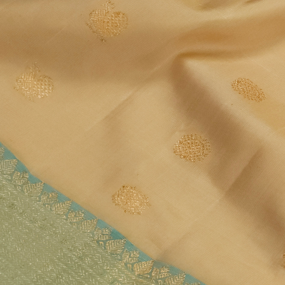 Premium Gadwal Silk Saree with woven zari motifs, luxurious brocade pallu, meenakari turning border, and matching contrast blouse.

