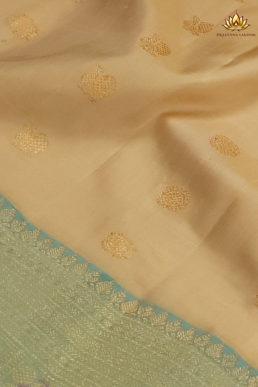 Premium Gadwal Silk Saree with woven zari motifs, luxurious brocade pallu, meenakari turning border, and matching contrast blouse.
