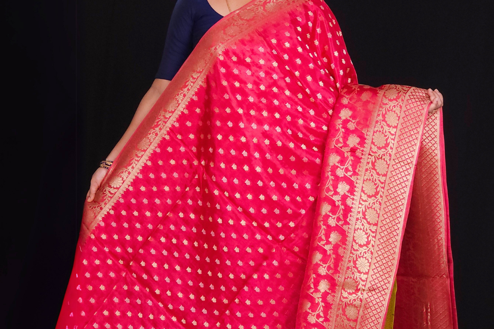Dark Pink  "Wine Banaras saree with allover floral motifs  gold Zari  border"