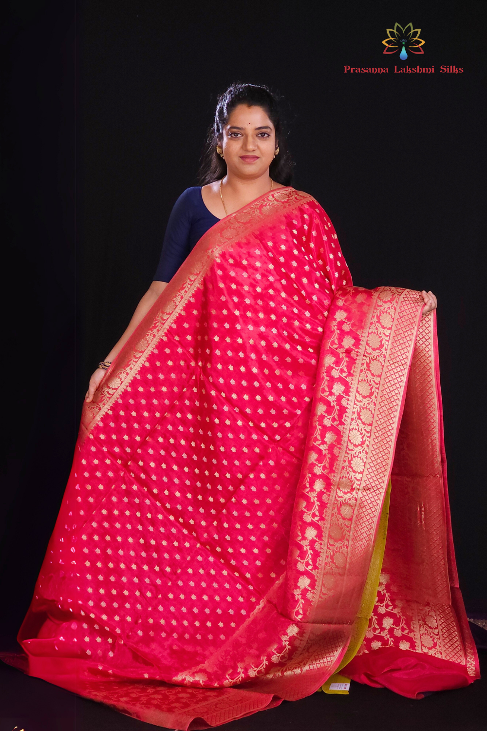 Dark Pink  "Wine Banaras saree with allover floral motifs  gold Zari  border"