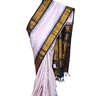 Handloom Gadwal pure silk saree with intricate small zari motifs and rich woven pallu.
