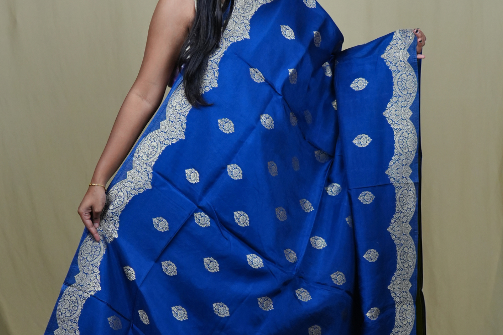 Elegant Banarasi Munga silk saree suitable for all occasions with intricate zari detailing.
