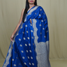 Banarasi Munga silk saree with all-over zari woven floral motifs and rich brocade pallu.
