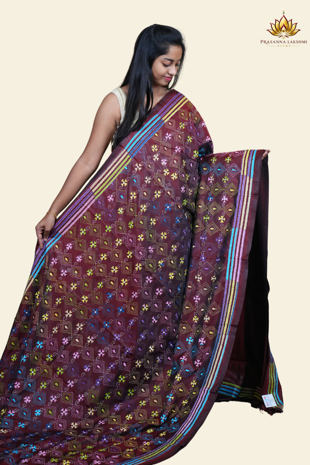 Elegant silk saree featuring Kantha work borders and detailed Kantha pallu design.
