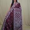 Semi Bangalore Silk Saree with all-over Kutch work motifs and rich embroidered pallu.

