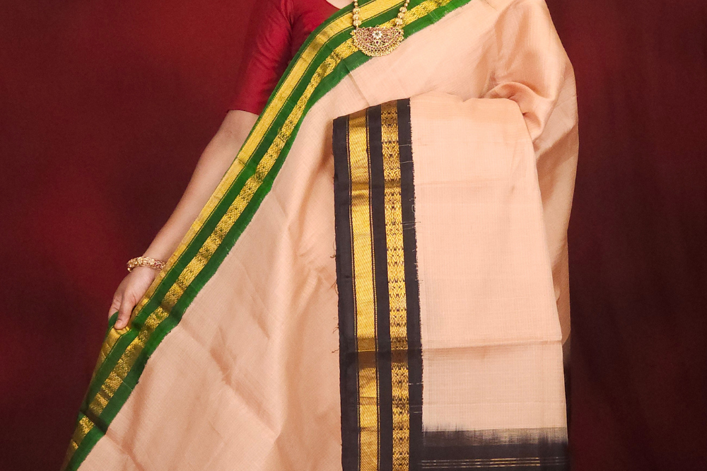 Lightweight Gadwal cotton saree featuring elegant zari border and striped pallu design.
