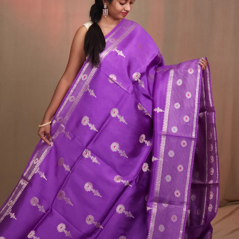 Traditional Chiniya silk saree featuring zari woven borders and stripe design