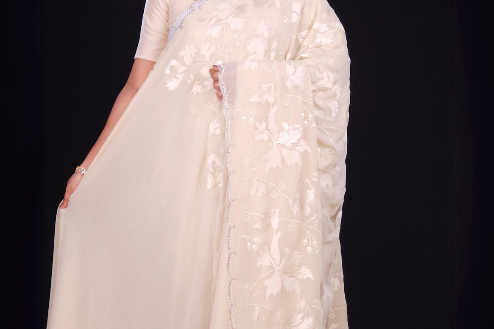 beige Lightweight georgette saree with contrast pallu