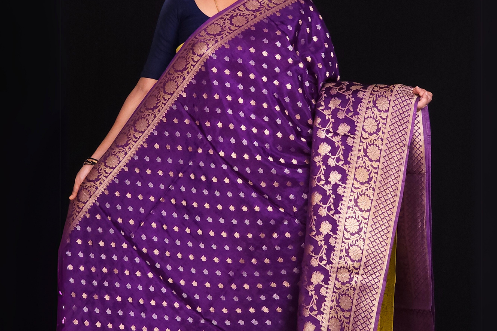  "Violet Banaras saree with allover floral motifs  gold Zari  border"