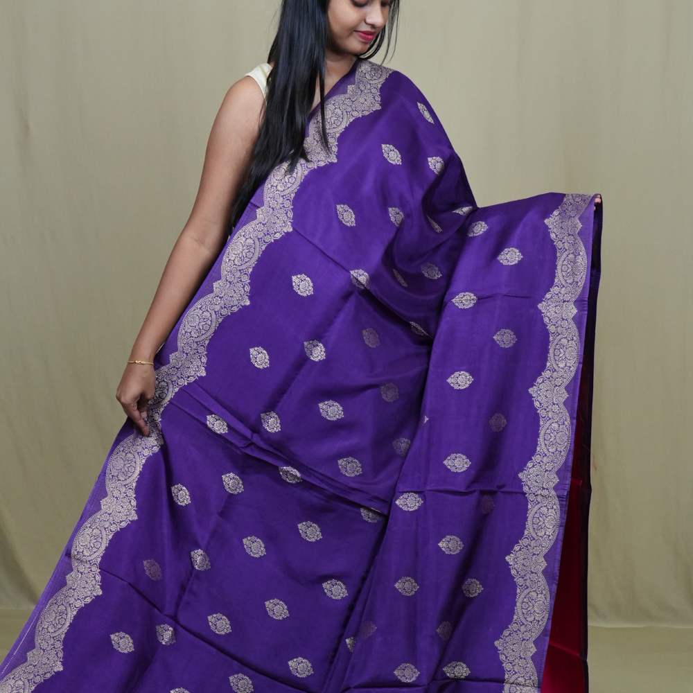 Elegant Banarasi Munga silk saree suitable for all occasions with intricate zari detailing.