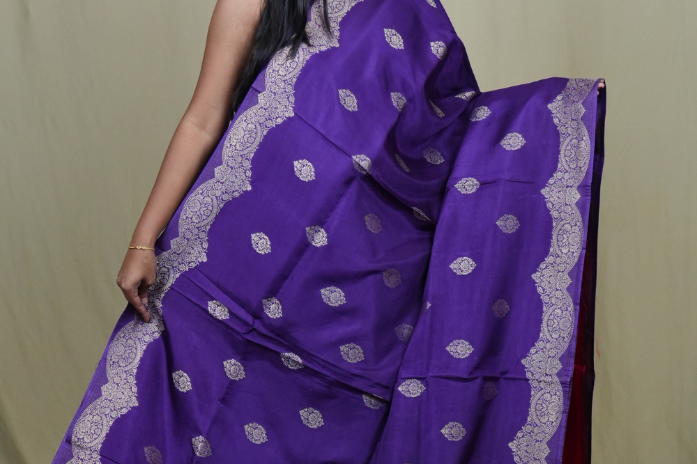 Elegant Banarasi Munga silk saree suitable for all occasions with intricate zari detailing.