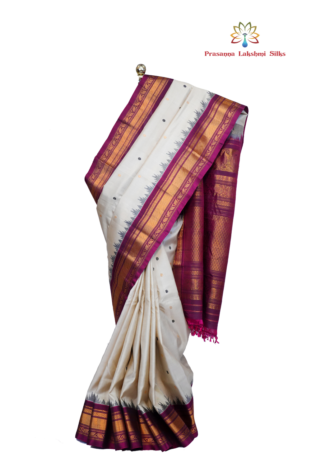 Handloom Gadwal pure silk saree with intricate small zari motifs and rich woven pallu.
