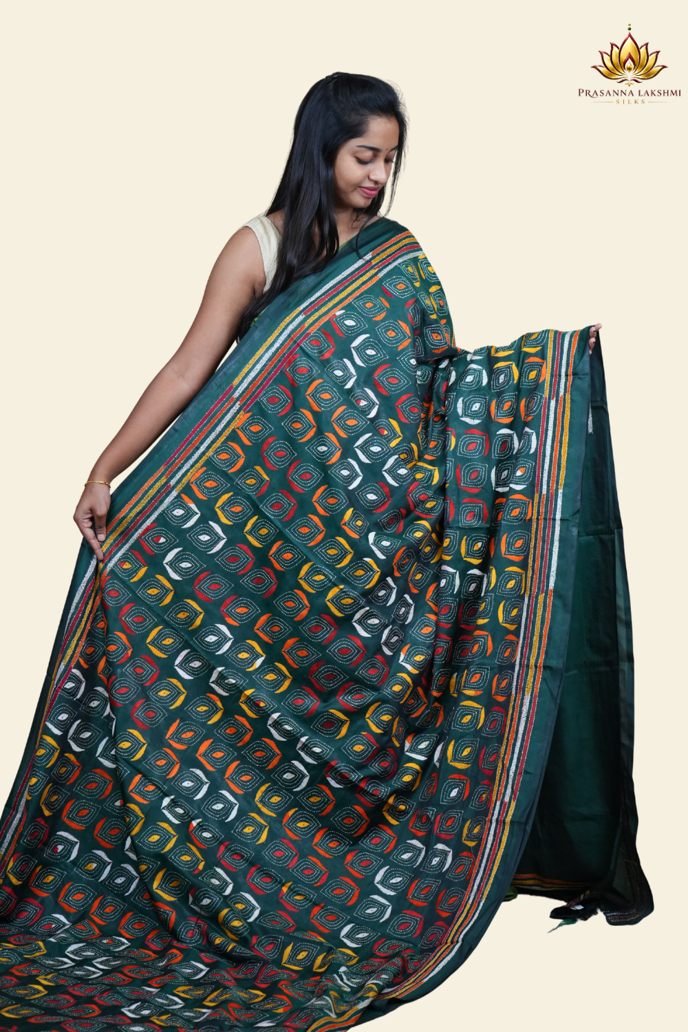 Elegant silk saree featuring Kantha work borders and detailed Kantha pallu design.