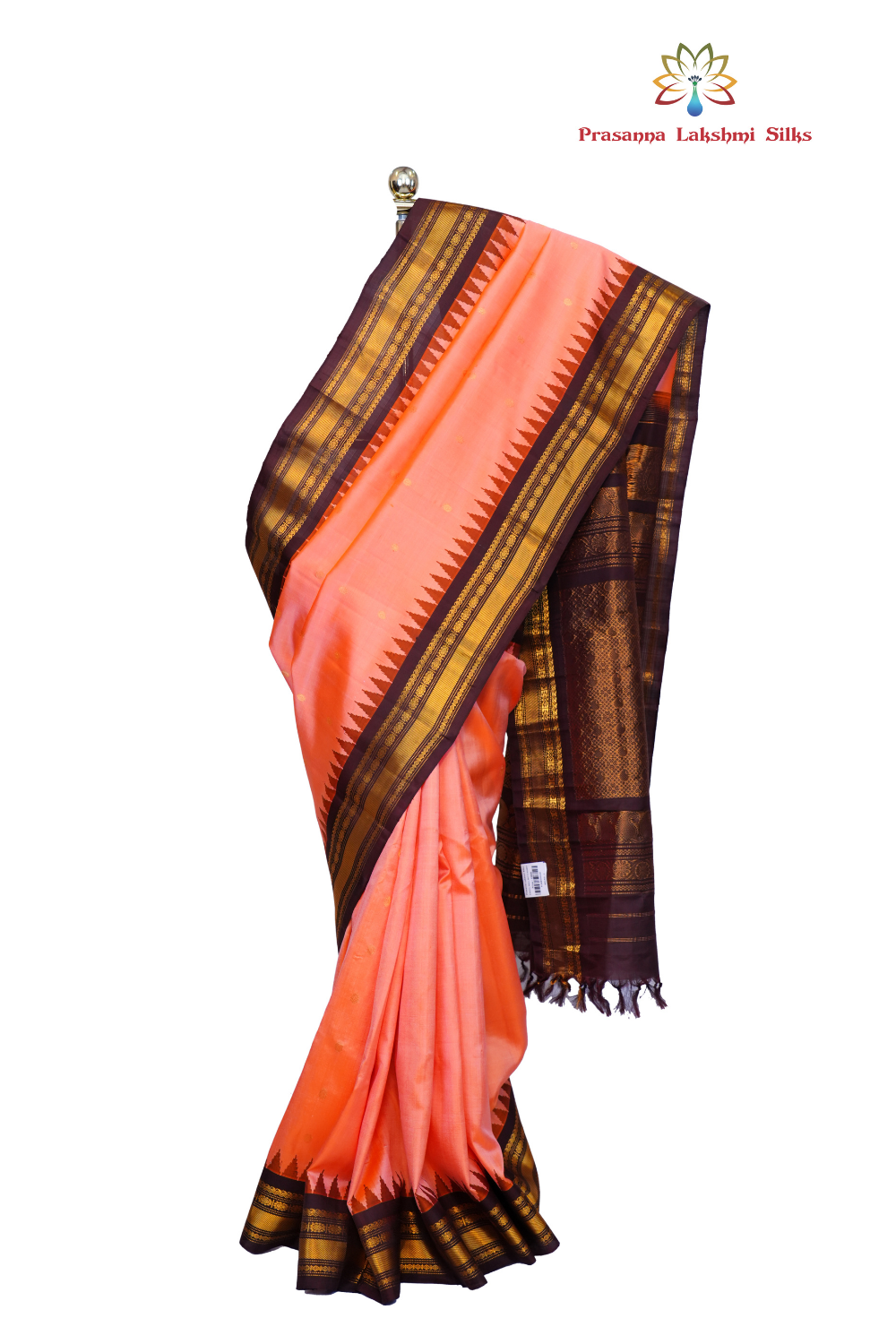 Handloom Gadwal pure silk saree with intricate small zari motifs and rich woven pallu.