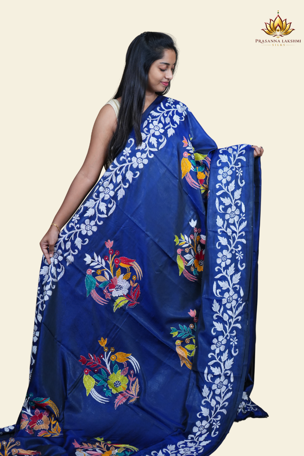 Elegant silk saree featuring Kantha work borders and detailed Kantha pallu design.
