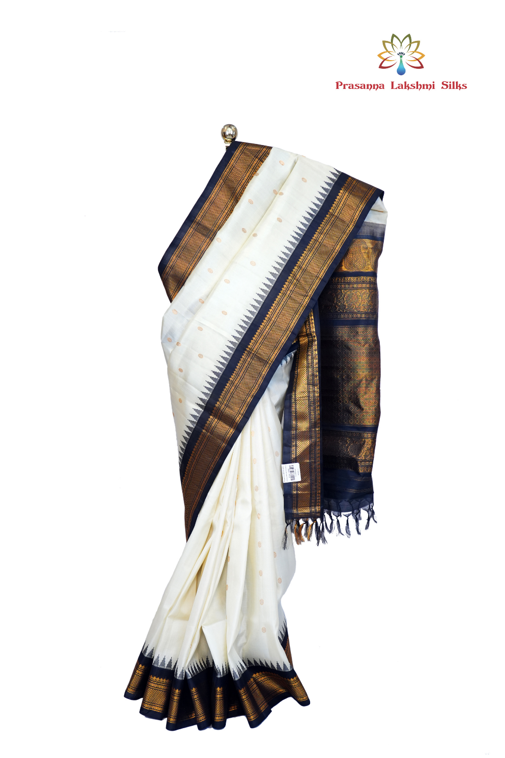 Handloom Gadwal pure silk saree with intricate small zari motifs and rich woven pallu.
