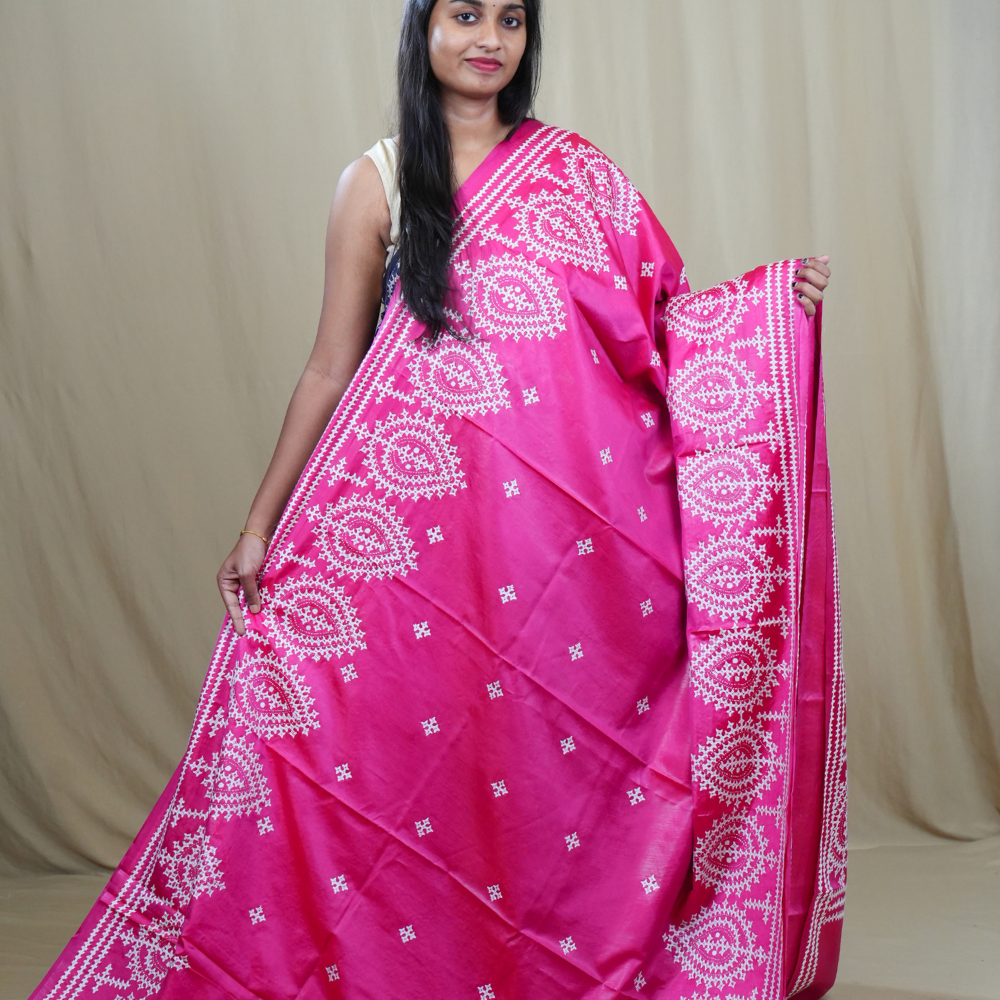 Traditional semi silk saree featuring beautiful hand Kutch work borders and artistic design.
