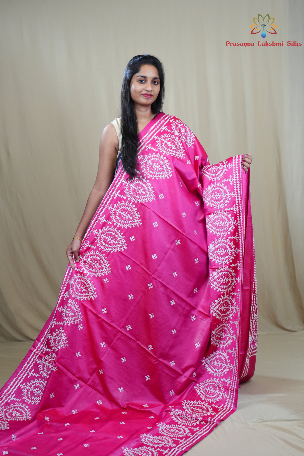 Traditional semi silk saree featuring beautiful hand Kutch work borders and artistic design.
