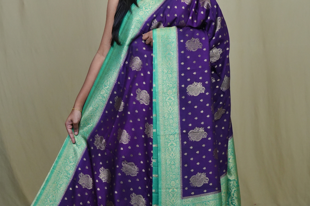 Semi Mysore silk saree with all-over zari woven motifs and rich brocade pallu.
