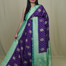 Semi Mysore silk saree with all-over zari woven motifs and rich brocade pallu.
