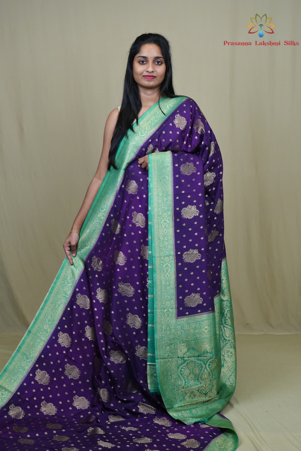 Semi Mysore silk saree with all-over zari woven motifs and rich brocade pallu.
