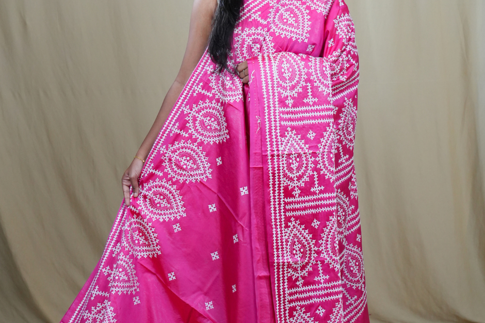 Semi Bangalore Silk Saree with all-over Kutch work motifs and rich embroidered pallu.
