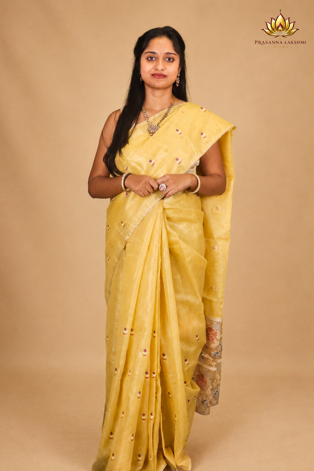 Jute Tissue saree with allover thread woven buttas
