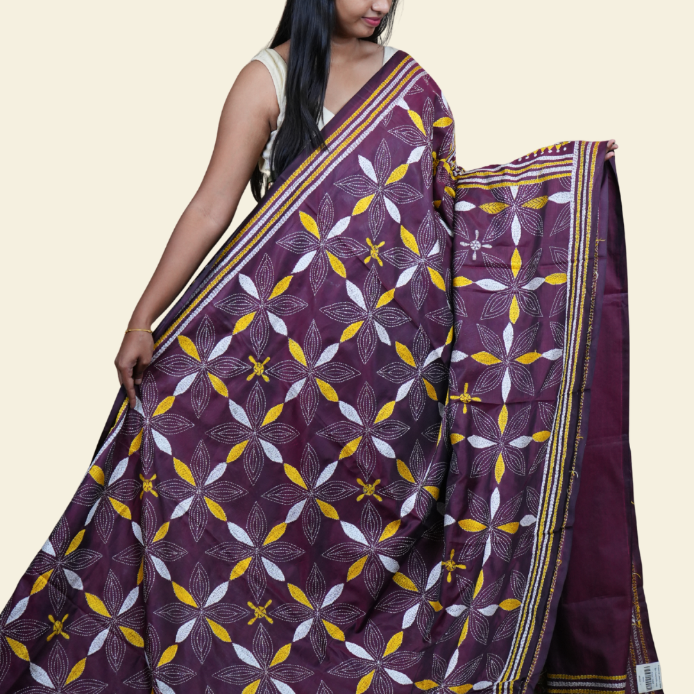 Elegant silk saree featuring Kantha work borders and detailed Kantha pallu design.
