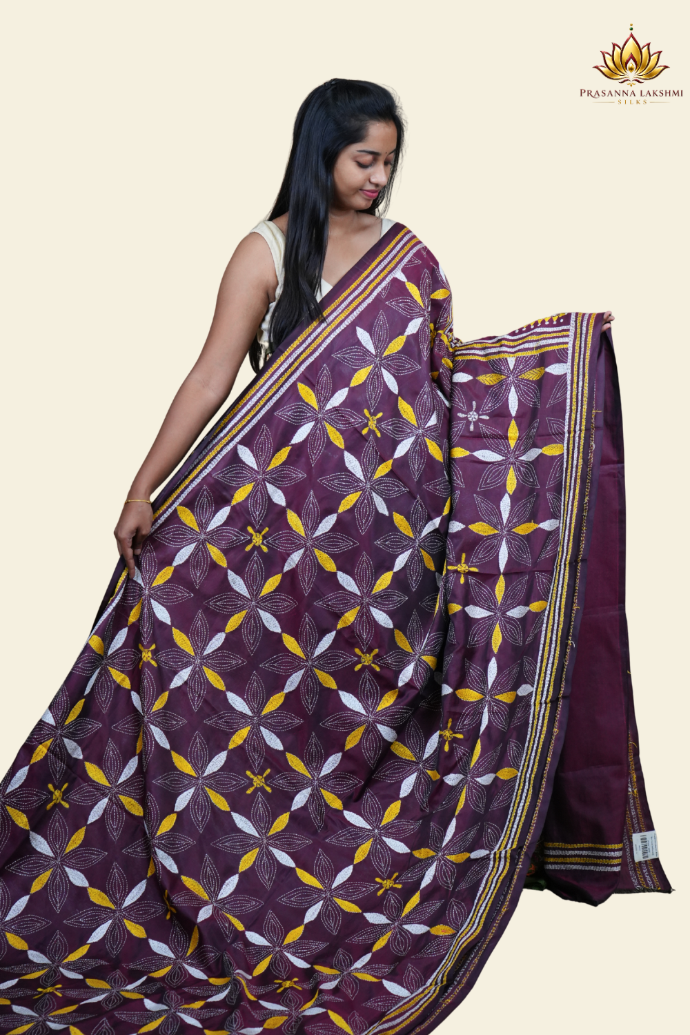 Elegant silk saree featuring Kantha work borders and detailed Kantha pallu design.

